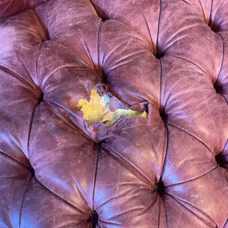 Leather couch rip repair before
