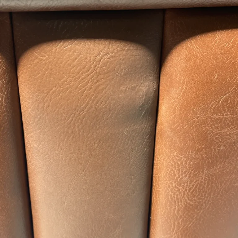Restaurant booth leather repair after