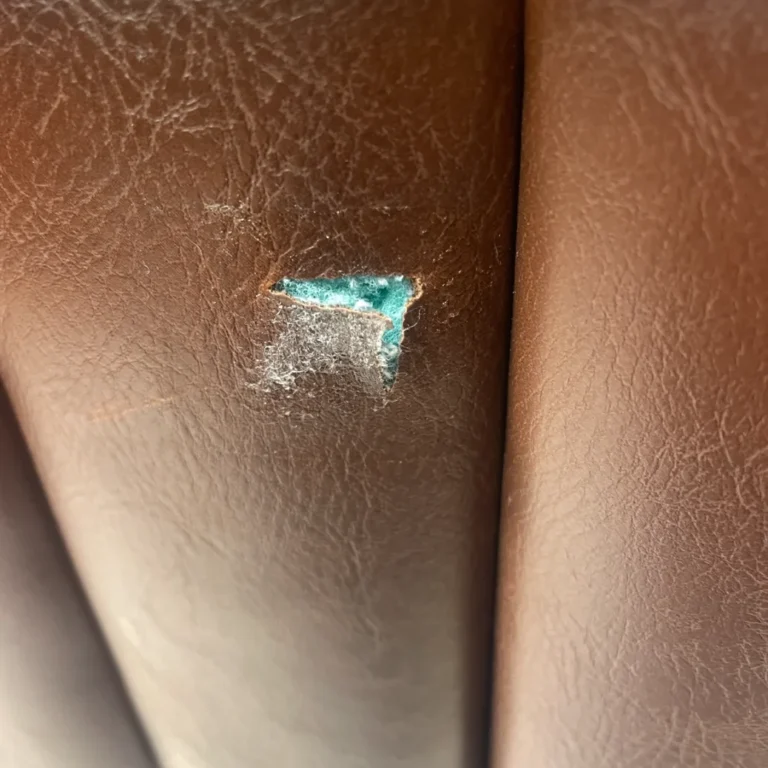 Restaurant booth leather repair before